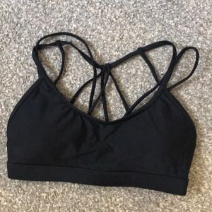 Black strappy Fabletics sports bra